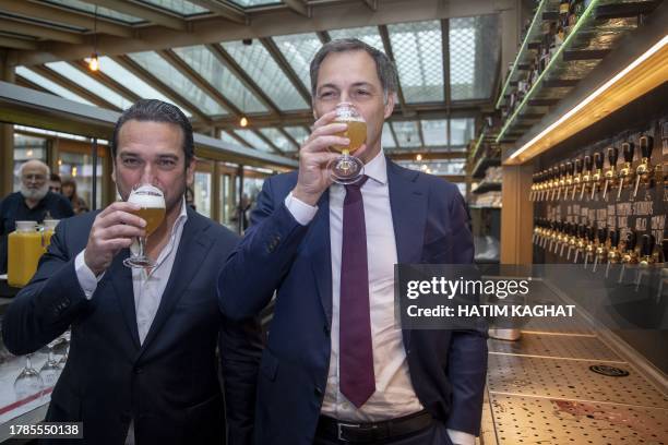 Belgian Brewers Krishan Maudgal and Prime Minister Alexander De Croo toast with a beer at the launch of a new generic promotional campaign around...