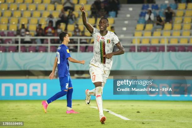 Mamadou Doumbia of Mali celebrates after scoring the team's second goal during the FIFA U-17 World Cup Group B match between Mali and Uzbekistan at...