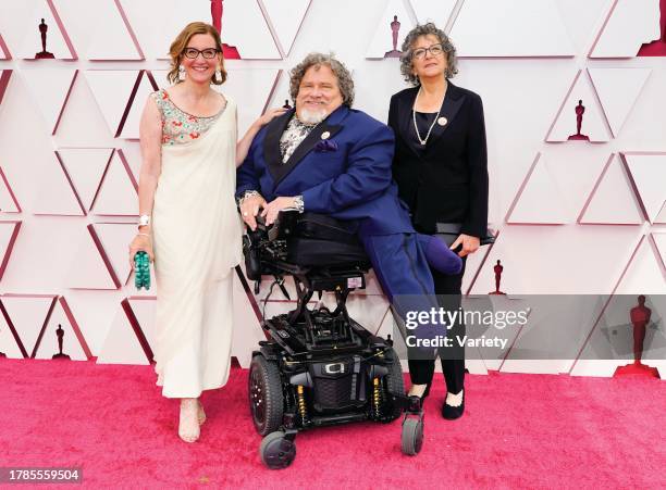 Nicole Newnham, from left, James Lebrecht, and Sara Bolder arrive at the Oscars on Sunday, April 25 at Union Station in Los Angeles.