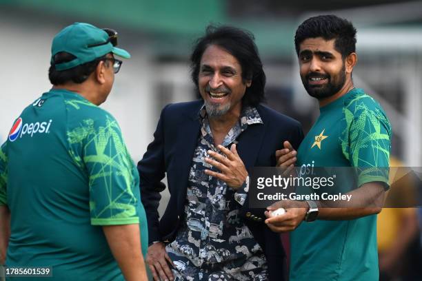 Former Pakistan captain Ramiz Raja speaks with Pakistan captain Babar Azam during a nets session at Eden Gardens on November 10, 2023 in Kolkata,...