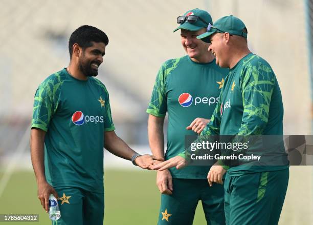 Pakistan captain Babar Azam speaks with coach Mickey Arthur during a nets session at Eden Gardens on November 10, 2023 in Kolkata, India.