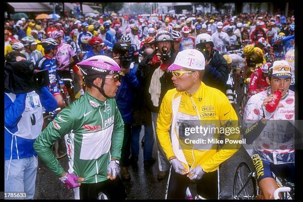 Jan Ullrich of Germany and Erik Babel of Germany confer during Stage 17 of the Tour de France between Fribourg and Colmar, France, July 23, 1997....