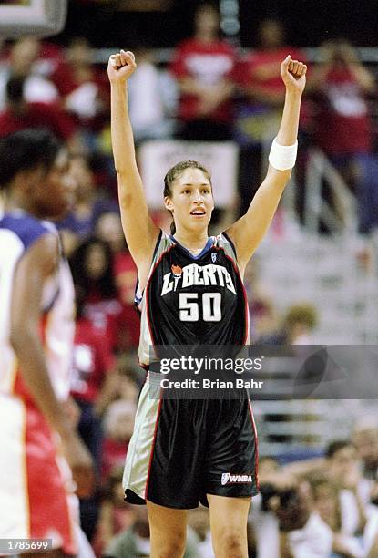 Rebecca Lobo of the New York Liberty stands on the court during a playoff game against the Phoenix Mercury at the America West Arena in Phoenix,...