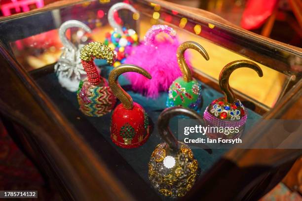 Display of hooks is arranged in a display during a media preview before the opening of the Neverland Christmas themed decorations at Castle Howard on...