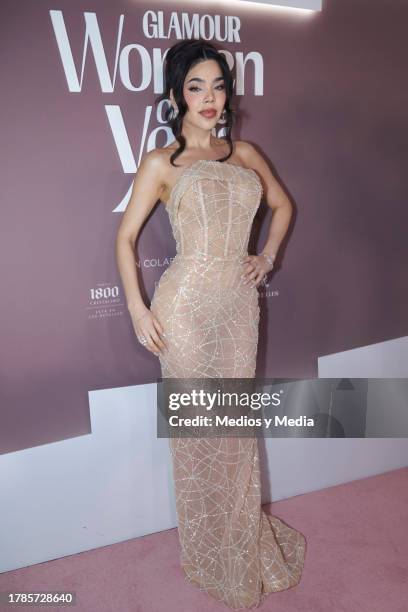 Kenia Os poses for a photo during a Red Carpet of 2023 Women of the Year, of Glamour Magazine at Hotel St. Regis on November 9, 2023 in Mexico City,...
