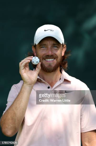 Tommy Fleetwood of England poses with his Rhino printed golf ball ahead of the second round of the Nedbank Golf Challenge at Gary Player CC on...