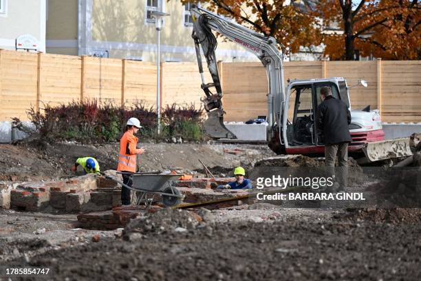 Workers are seen at the construction site near the birth house of Adolf Hitler in Braunau am Inn, Austria, on November 16 on the occasion of a press...