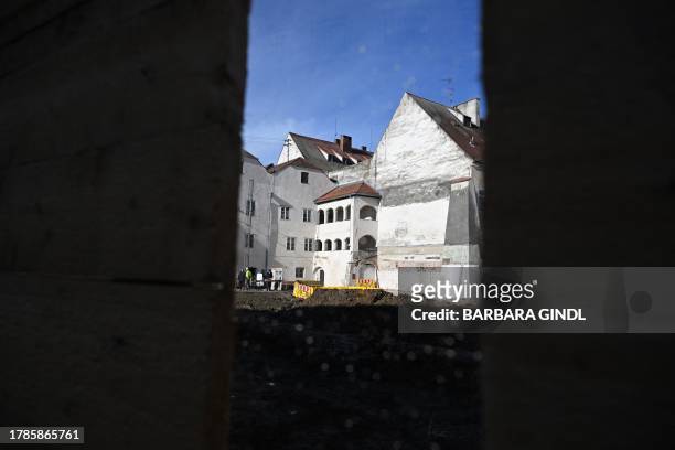 Photo taken on November 16, 2023 through a fence shows the construction site near the birth house of Adolf Hitler in Braunau am Inn, Austria, on the...