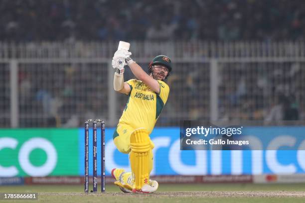 Australia's Travis Head plays a shot during the ICC Men's Cricket World Cup 2023 semi final match between South Africa and Australia at Eden Gardens...