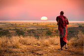 Masai warrior at sunset.