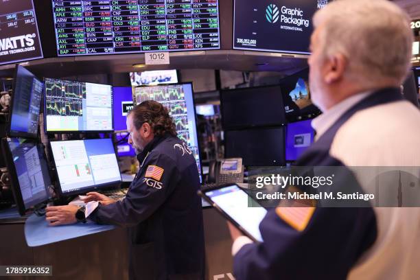 Traders work on the floor of the New York Stock exchange during morning trading on November 10, 2023 in New York City. Stocks rose during the opening...