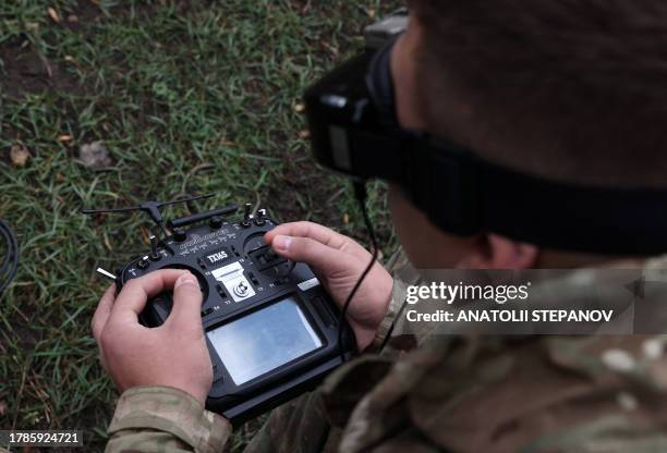 Ukrainian FPV drone operator trains not far from the front line in Donetsk region on November 16 amid the Russian invasion of Ukraine.