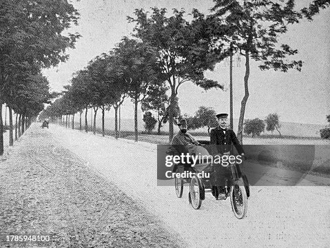Doctor Rith Driver A Doctor With Driver On The Road In A Motorized Bicycle Carriage High ...