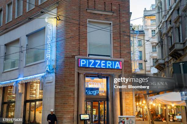 Pizzeria in Via Cappellari near the Piazza Duomo in Milan, Italy, on Wednesday Nov. 15, 2023. A possible downgrade of Italy to junk this week would...