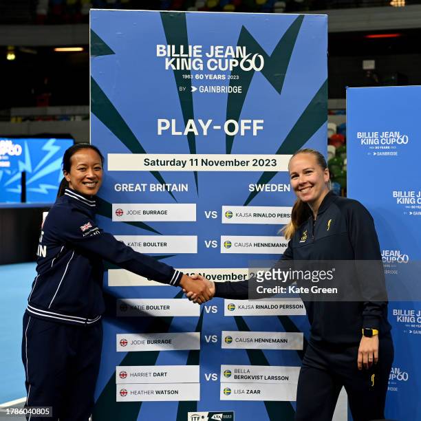 Anne Keothavong of Great Britain shakes hands with Johanna Larsson of Sweden prior to the Billie Jean King Cup Play-Off match between Great Britain...