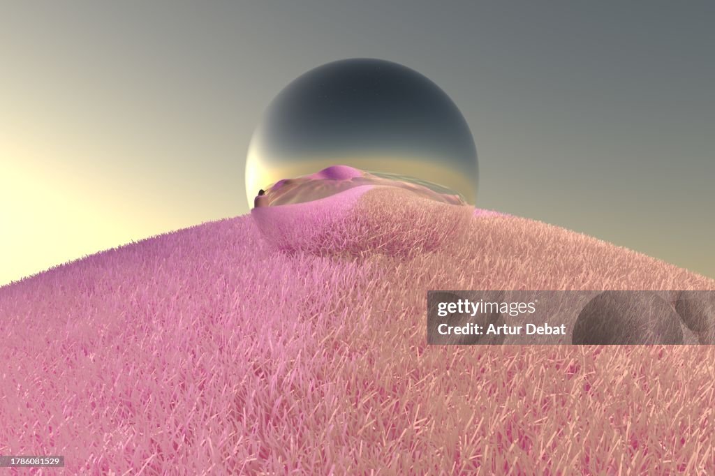 Metallic sphere reflecting the digital surreal landscape with pink grass from another dimension.