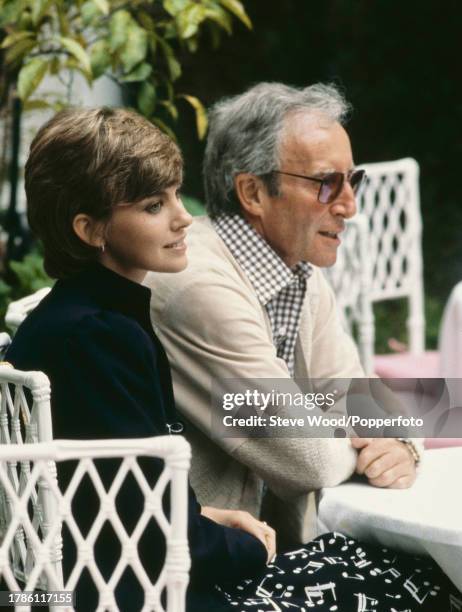 British comedian and actor Peter Sellers with his wife Lynne Frederick , an English actress, during the Cannes Film Festival in Cannes, France, circa...