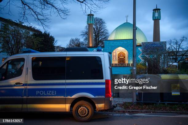 Police stand outside the Imam Ali Mosque the Islamic Center Hamburg following a raid on November 16, 2023 in Hamburg, Germany. Police raided the...