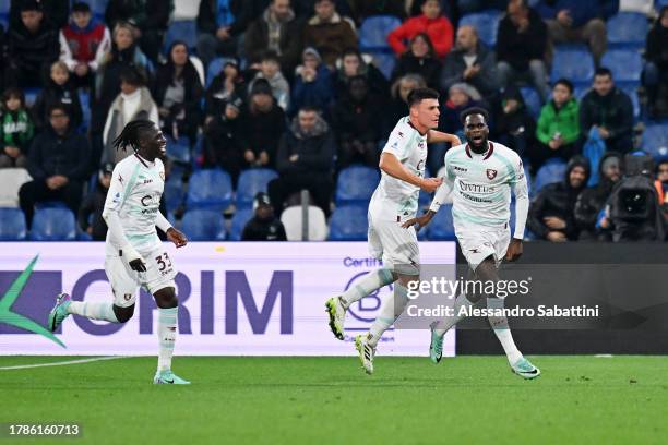 Boulaye Dia of US Salernitana celebrates with teammates after scoring the team's second goal during the Serie A TIM match between US Sassuolo and US...