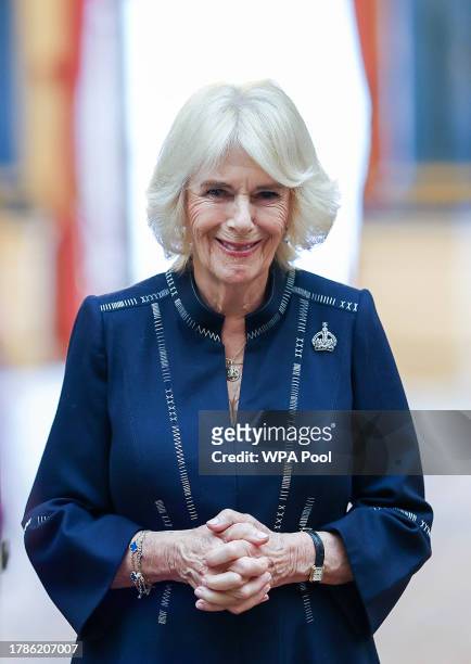 Queen Camilla hosts a reception at Buckingham Palace for winners of The Queen's Commonwealth Essay Competition 2023 QCEC on November 16, 2023 in...
