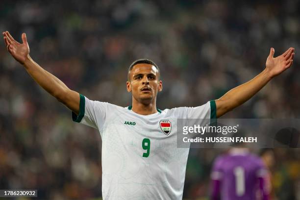 Iraq's forward Ali al-Hamadi celebrates scoring his team's fifth goal during the 2026 FIFA World Cup AFC qualifiers football match between Iraq and...