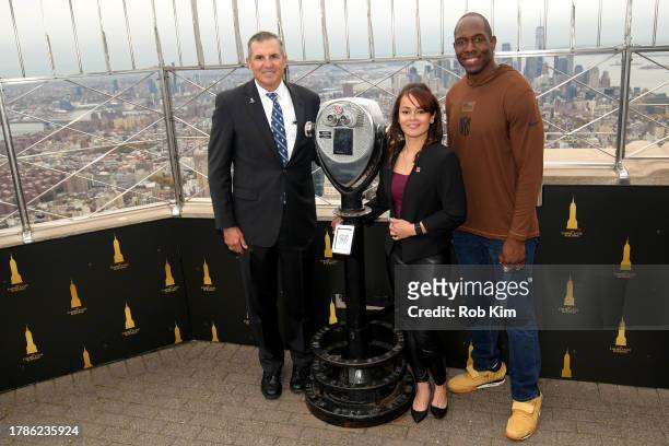 Lt. Gen. Mike Linnington, Antoinette Wallace and Kevin Boothe light the Empire State Building in Honor of Veteran's Day at The Empire State Building...
