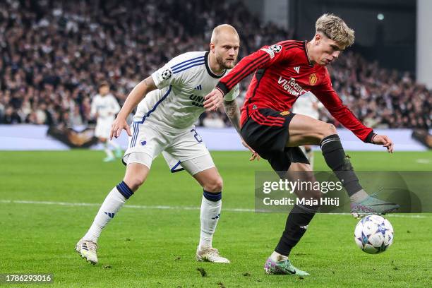 Alejandro Garnacho of Manchester United battles for possession with Nicolai Boilesen of F.C. Copenhagen during the UEFA Champions League match...