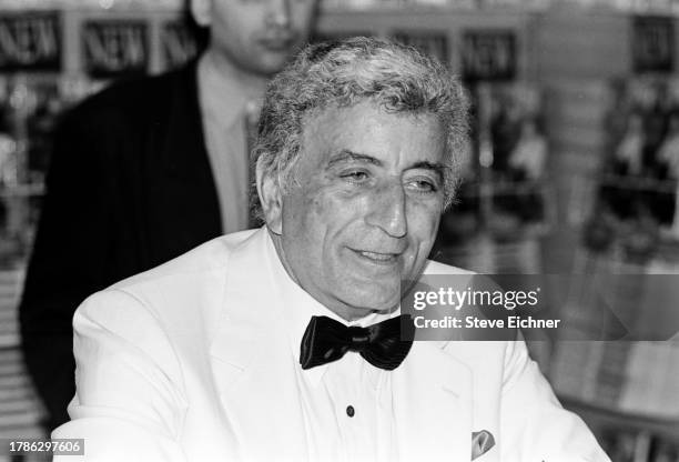 View of American Pop and Jazz musician Tony Bennett as he attends a CD release event at a Sam Goody record store, New York, New York, September 19,...