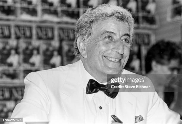 View of American Pop and Jazz musician Tony Bennett as he attends a CD release event at a Sam Goody record store, New York, New York, September 19,...