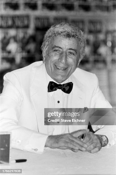 View of American Pop and Jazz musician Tony Bennett as he attends a CD release event at a Sam Goody record store, New York, New York, September 19,...