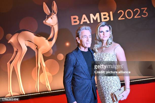 November 2023, Bavaria, Munich: Singer Peter Maffay with his partner Hendrikje Balsmeyer at the 75th Bambi Awards at the Bavaria Film Studios. The...