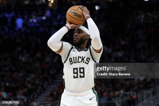 Jae Crowder of the Milwaukee Bucks takes a shot during a game against the Detroit Pistons at Fiserv Forum on November 08, 2023 in Milwaukee,...