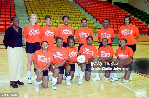 Claflin University's Women's volleyball team with coach posing for group photograph at Edward L. Tullis Arena in Orangeburg, South Carolina.