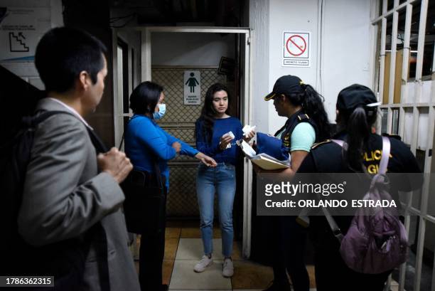 Marcela Blanco , a member of the Semilla Party, arrives handcuffed to a hearing at the Palace of Justice after being arrested at her home in...