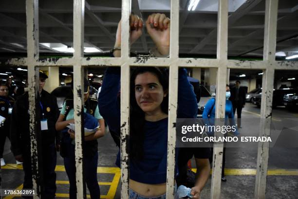 Marcela Blanco , a member of the Semilla Party, arrives handcuffed to a hearing at the Palace of Justice after being arrested at her home in...