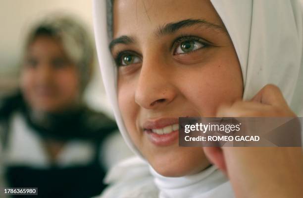 Zahraa Raad, 12-years-old, in Grade 6, attends an Islamic religious class at the Biarik Elementary school for girls, on the first day of classes in...