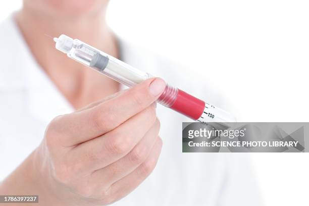 doctor with autoinjector - insulin pen stock pictures, royalty-free photos & images