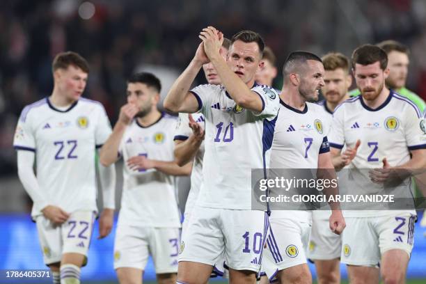 Scotland's striker Lawrence Shankland and teammates greet supporters after the UEFA Euro 2024 football tournament Group A qualifying match between...