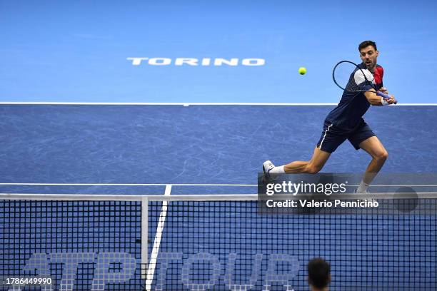 Marcel Granollers of Spain and Horacio Zeballos of Argentina in action against Maximo Gonzalez and Andres Molteni of Argentina in the Men's Doubles...