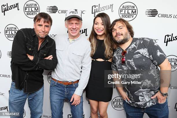 Richard Linklater, Mike White, Miranda Cosgrove and Jack Black pose on the red carpet during the ten year anniversary screening of School of Rock at...