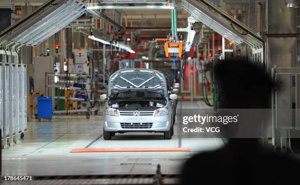 General view of the production line of New Santana sedan is seen at a plant of Shanghai Volkswagen on August 29, 2013 in Urumqi, China. The plant of...