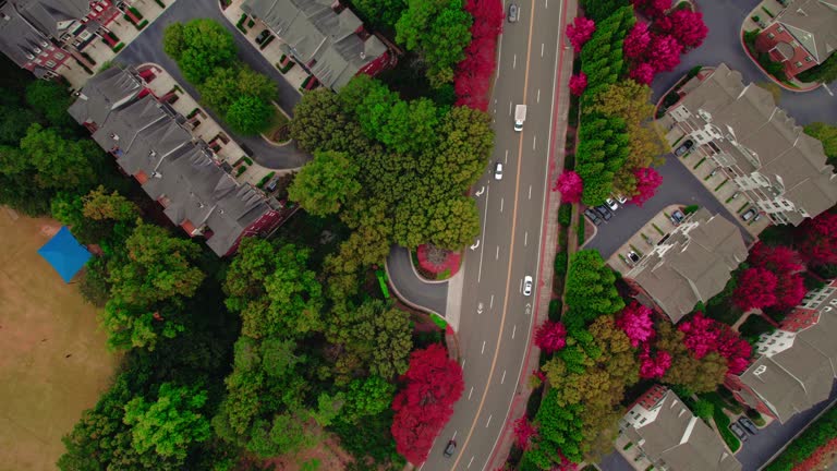 https://media.gettyimages.com/id/1786493436/video/aerial-top-view-over-an-urban-area-divided-by-a-highway-in-atlanta-georgia-fall-season.jpg?b=1&s=640x640&k=20&c=u_2j8hwY6XWN64ymch6MsGbMJ7QIKzgw21gNyzI6UDs=