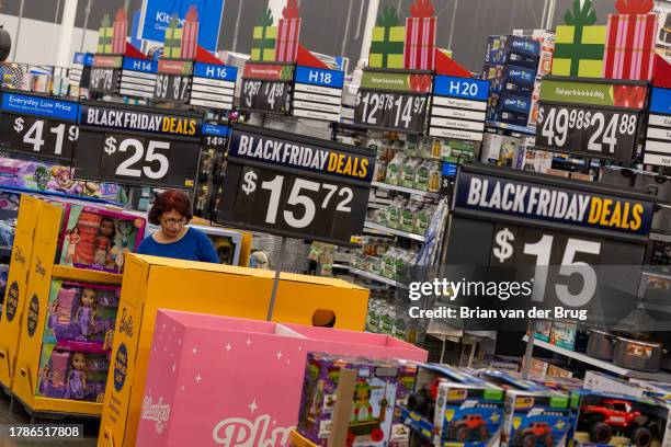 Burbank, CA Black Friday deals line the aisles as shoppers look for bargains at the Walmart Supercenter on Tuesday, Nov. 14, 2023 in Burbank, CA.