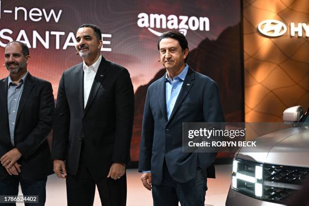 Amazon Vice President of Worldwide Corporate Business Development Marty Mallick, Hyundai Motor America Chief Executive Officer Randy Parker and...