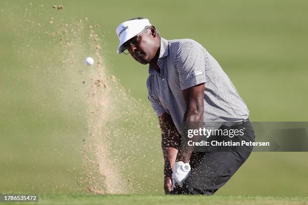 Vijay Singh of Fiji chips from the bunker onto the ninth green during the second round of the Charles Schwab Cup Championship at Phoenix Country Club...