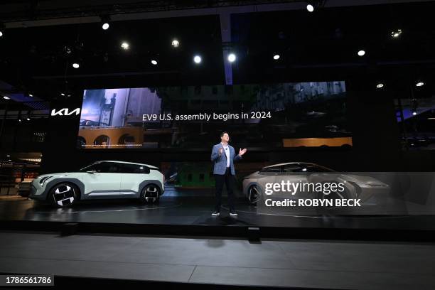 Kia America Vice President, Sales Operations Eric Watson unveils the Kia Concept EV3 and EV4 during the Kia press conference at Automobility LA, the...