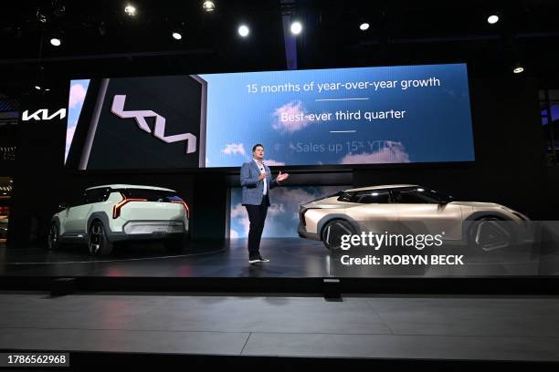 Kia America Vice President, Sales Operations Eric Watson unveils the Kia Concept EV3 and EV4 during the Kia press conference at Automobility LA, the...