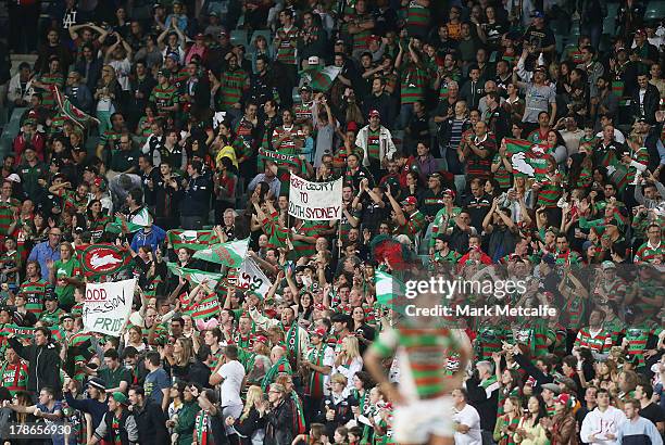 Rabbitohs fans celebrate a try during the round 25 NRL match between the Wests Tigers and the South Sydney Rabbitohs at Allianz Stadium on August 30,...