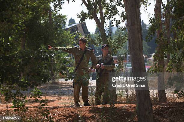 Israeli soldiers guard the 'Iron Dome' missile defense system on August 30, 2013 in Tel Aviv, Israel. Tensions are rising in Israel amid...