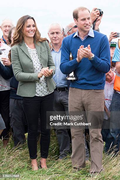 Catherine, Duchess of Cambridge and Prince William, Duke of Cambridge start The Ring O'Fire Anglesey Coastal Ultra Marathon on August 30, 2013 in...